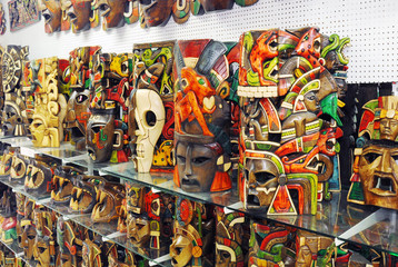 Mexican masks in the window of gift shop