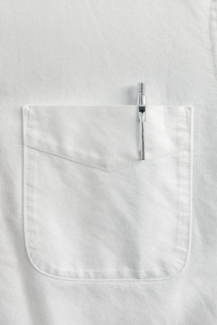 Close Up Pen In Pocket On White Shirt