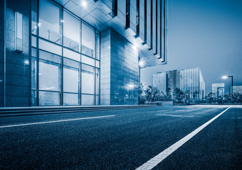 clean asphalt road through office block area,suzhou,china.