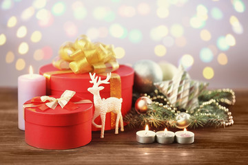 Fototapeta na wymiar Christmas presents and decoration on wooden table