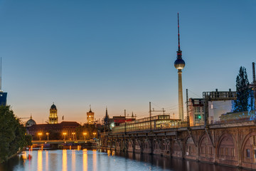 Fototapeta na wymiar Twilight at the river Spree in Berlin with the TV Tower
