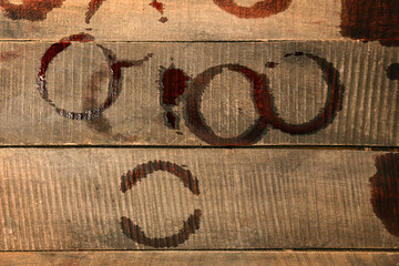 Wine stains on wooden background