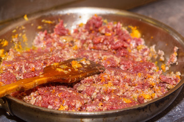 Meat for Bolognaise cooked in the pan.