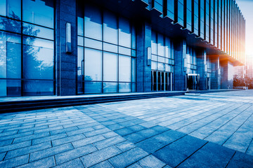 empty brick road nearby office building,china.