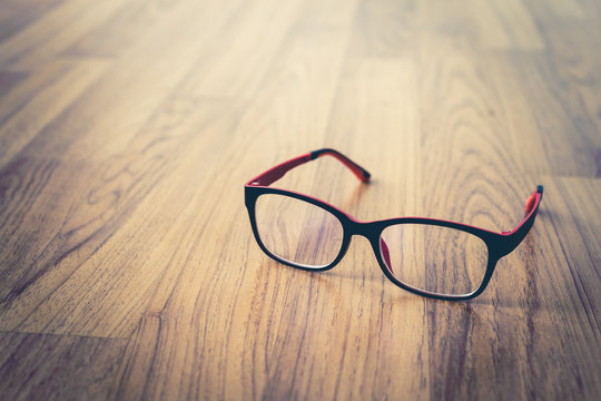 glassses on wooden floor. vitage style.