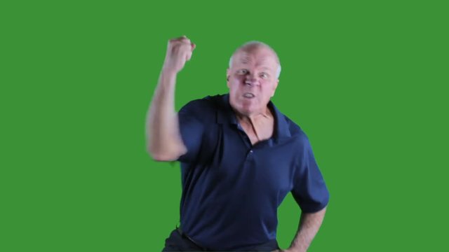 Man showing angry emotion on green screen.