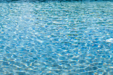 Blurred abstract background of swimming pool.