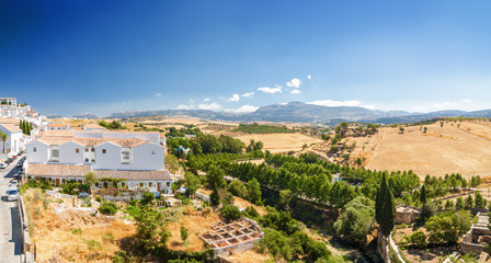 Fototapeta na wymiar Sunny panoramic view of fields near Ronda, Andalusia province, Spain.