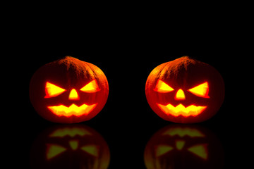 Pumpkin, Halloween pumpkin lantern, Pumpkin jack o lantern shiny head on black background.