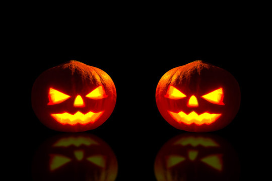 Pumpkin, Halloween pumpkin lantern, Pumpkin jack o lantern shiny head on black background.