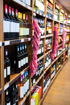 Variety of wine bottles in grocery section