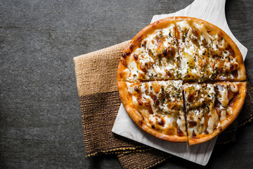 Hawaiian pizza served on wooden table.Top view.