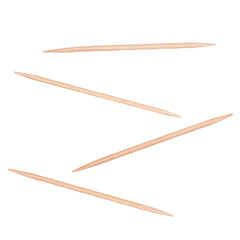 wooden toothpicks closeup on isolated white background