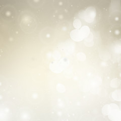 Gray bokeh christmas background with light beams