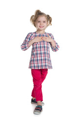 Fashion little girl is walking