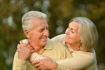 Senior couple in autumn park