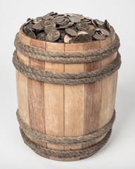 Wooden barrel with coins