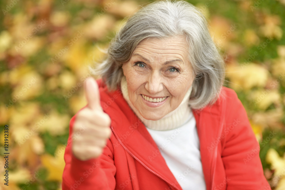 Canvas Prints senior woman showing thumb up