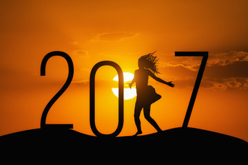 silhouette Woman jumping over 2017 - obrazy, fototapety, plakaty