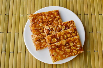 sweet peanuts stick on dish