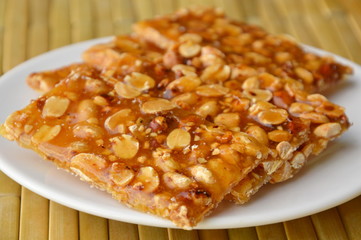 sweet peanuts bar on dish