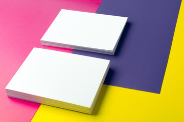 Business card blank over colorful abstract background.