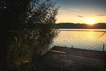 Pier on the lake sunset idyllic mood