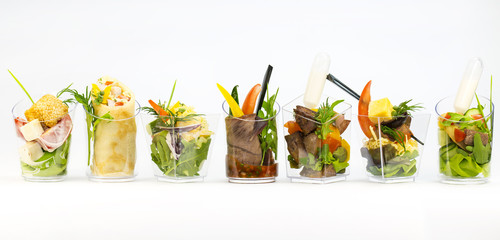 Mini Canape with meat and vegetables in plastic cups