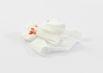 Blood on tissue on white background