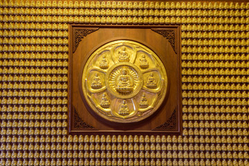 NonTaburi,Thailand - Sep 25 , 2016 : Golden Sculpture wall in chinese temple