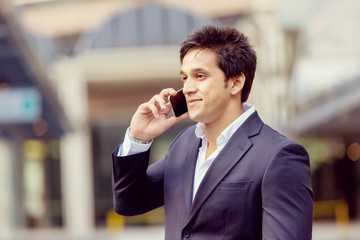 Portrait of confident businessman outdoors