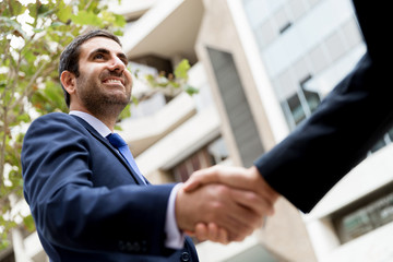 Fototapeta premium Two businessmen shaking their hands