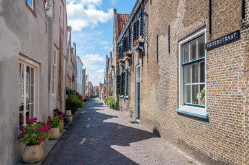 Fototapeta na wymiar Narrow street in the small Dutch city of Goedereede