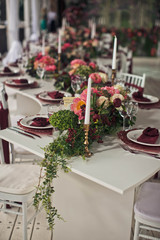 View of the wedding table decorated with flowers