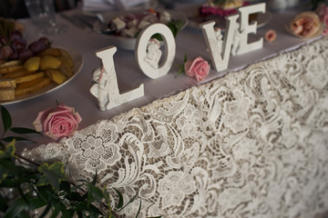 The decorations stand on the wedding table