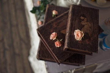 The ancient books  stand on the wedding table