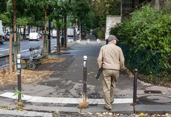 Old man alone on street