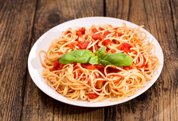 plate of pasta with tomato sauce