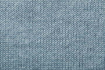 Closeup knitting blue texture for you winter background