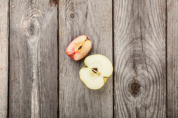Apples on gray old planks wood table