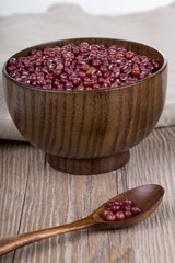 Red Beans in a wooden bowl on the white background