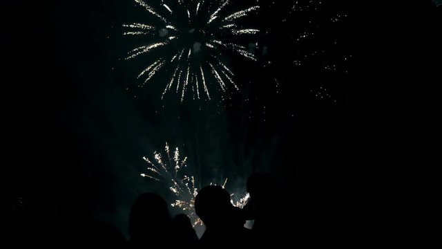 Crowd watching fireworks and celebrating