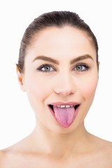 Portrait of beautiful woman posing against white background