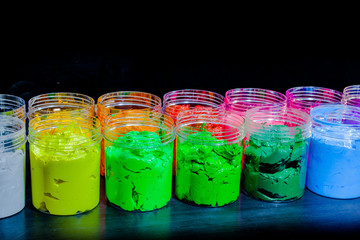 ink or paint for printing on fabric there are several types. The ink used for printing on dark fabric always use plastisol ink. it useful for white fabric too