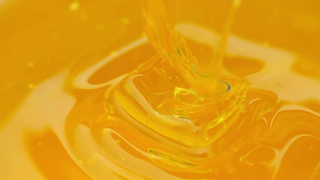 Close-up of honey dripping.
