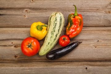 Vegetables on brown old planks wood table