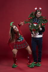 Embarrassed man and his funny girlfriend