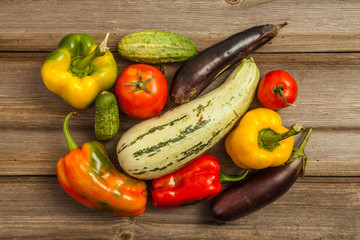 Vegetables on brown old planks wood table