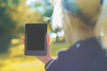 Woman holding tablet