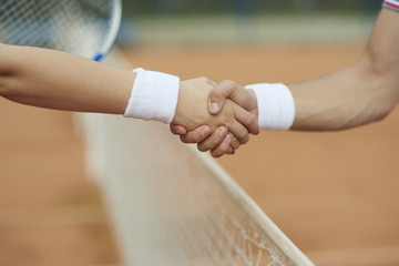 Handshake after good tennis game